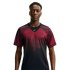 A man wearing a black Nike t-shirt with a large, red web-like graphic on the chest, facing forward against a white background.