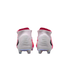Rear view of white and pink high-top Nike soccer cleats with an iridescent sole plate and ridged heel detail.