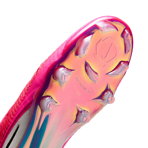 Close-up of an iridescent pink and gold Nike soccer cleat sole with clear studs and "NIKE CYCLONE 360" text.