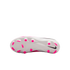 Bottom view of a white Nike soccer cleat with bright pink studs and a black Nike swoosh logo on the heel.