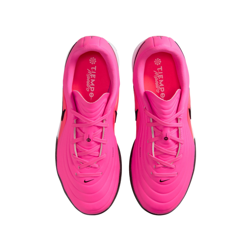 Top-down view of a pair of neon pink Nike Tiempo soccer shoes with matching laces and insoles featuring the "TIEMPO Maestro" logo.