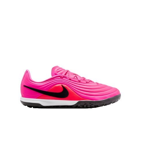 Bright pink Nike turf soccer shoe with a black swoosh, red accents, and wavy textured upper. Features a white midsole and black studded outsole.