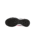Bottom view of a black Nike shoe sole with a textured geometric tread pattern and a center swoosh logo, showing hints of a white and red midsole against a white background.
