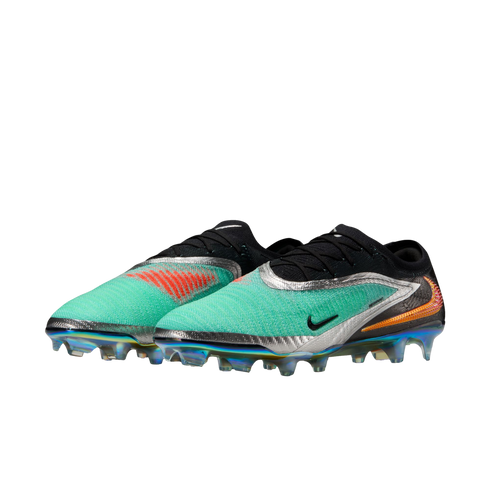 A pair of Nike Phantom GX 2 Elite soccer cleats in teal, black, and silver with an iridescent soleplate, shown from a three-quarter view against a white background.