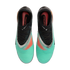 Top-down view of a pair of Nike Phantom soccer boots in turquoise and black with silver accents and orange striped details.