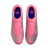 Top-down view of pink and grey patterned Nike soccer cleats with pink laces and blue insoles featuring the VJR logo, set against a black background.