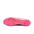 Underside of a pink soccer cleat with purple studs on a black background.