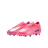 A pair of iridescent pink Nike soccer cleats with purple accents, set against a solid black background.