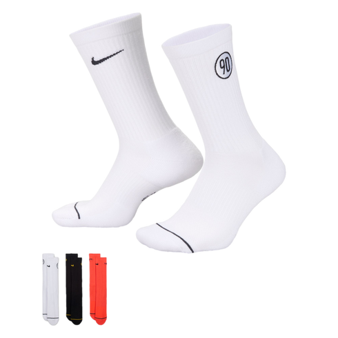 White Nike crew socks featuring a swoosh and "90" logo. A small inset shows additional color options: white, black, and orange.