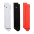 Three pairs of Nike Total 90 crew socks in white, black, and bright orange, displayed vertically against a black background. Each features a small swoosh and a contrasting line near the toe.