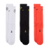 Three pairs of Nike T90 crew socks in white, black, and red, featuring small logos and size markings, arranged vertically on a black background.