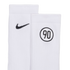 Close-up of two white ribbed Nike socks. One has a black Nike swoosh, and the other features a "90" inside a circle.