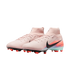A pair of light pink Nike high-top soccer cleats with black swooshes, multicolored heel accents, and red studs, isolated against a solid black background.
