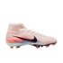 Side view of a light pink Nike soccer cleat with a black Swoosh, colorful heel graphic, and high-top collar on a black background.