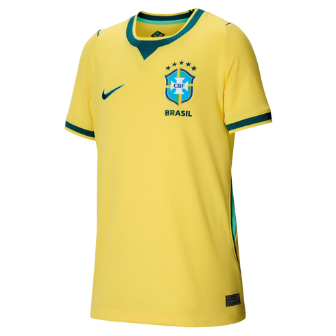 A yellow Brazil national team football jersey with green trim, featuring the team crest and Nike swoosh.