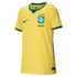 A yellow Brazil national team football jersey with green trim, featuring the team crest and Nike swoosh.