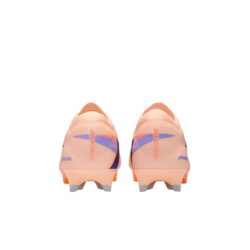 Rear view of peach Nike Mercurial soccer cleats with purple and blue accents, featuring Mercurial and Air Zoom branding on the heels.