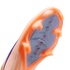 Close-up of the orange and iridescent sole of a Nike Air Zoom soccer cleat, showing the forefoot stud configuration against a black background.