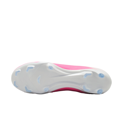 The white soleplate of a pink soccer cleat with translucent blue chevron and conical studs on a white background.