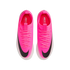 Top-down view of a pair of bright pink Nike Mercurial Vapor soccer cleats with black Nike swooshes and white-patterned soles, against a white background.