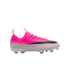 A bright pink and white Nike soccer cleat with a large black swoosh, pink laces, and a studded white sole.