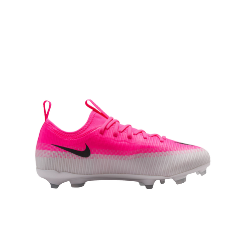 Side profile of a pink and white Nike soccer cleat with a black swoosh and white studded sole, isolated on a white background.