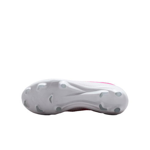 The white sole of a Nike soccer cleat features various traction studs and a faint Nike swoosh logo.