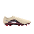 A side-profile view of a Nike soccer cleat featuring a cream-colored ridged upper, a large silver Swoosh over a maroon and black patterned midsection, and a maroon soleplate with red studs against a black background.