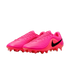 A pair of vibrant pink Nike soccer cleats featuring a ridged, textured upper and a prominent black swoosh on the side, set against a plain white background.