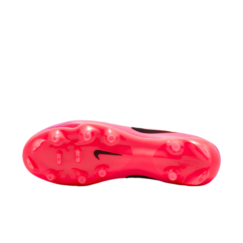 Underside view of a pink Nike Tiempo soccer cleat, featuring a translucent pink soleplate with traction studs and a small black swoosh logo.