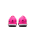 Rear view of two vibrant pink soccer shoes with black "Maestro" branding on the heels and black soles, centered on a white background.