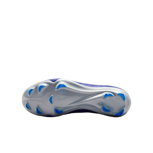 The metallic silver sole of a purple Nike soccer cleat, featuring bright blue studs, against a plain white background.