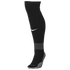 A black knee-high Nike soccer sock featuring a white swoosh, a grey ankle band, and a patterned grey footbed, shown in a side profile view.