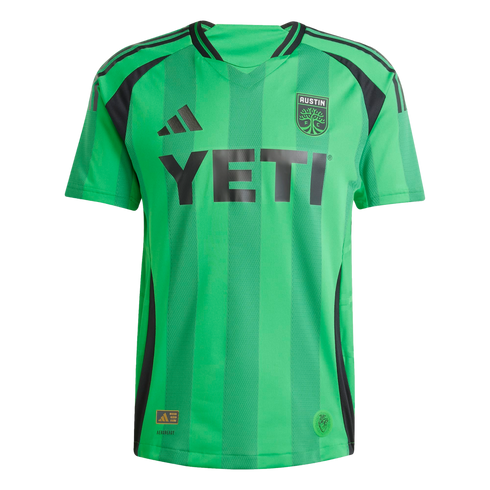 A green Austin FC soccer jersey with black accents, a large YETI logo on the chest, and the team's tree-themed crest.