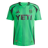A green Austin FC soccer jersey with black accents, a large YETI logo on the chest, and the team's tree-themed crest.