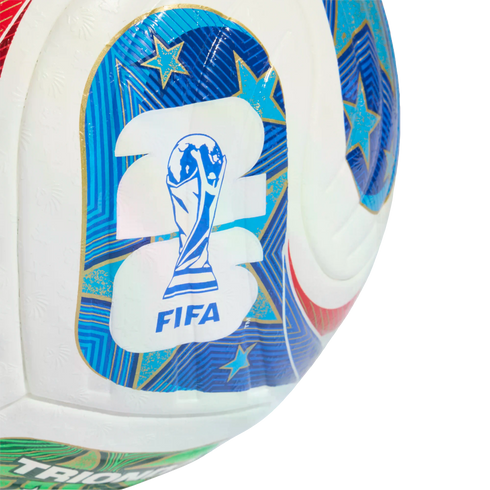 Close-up of a white soccer ball with the official 2026 FIFA World Cup logo featuring the trophy and the number 26.