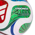 Close-up of a Trionda League replica soccer ball with green, gold, and red graphics. The ball features multilingual text and icons including a star, maple leaf, and eagle head.