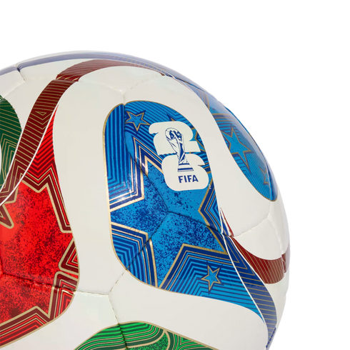 Close-up of a white soccer ball with red, blue, and green geometric star designs and the FIFA World Cup 2026 logo, set against a solid black background.