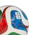 Close-up of a white soccer ball with red, blue, and green geometric star designs and the FIFA World Cup 2026 logo, set against a solid black background.