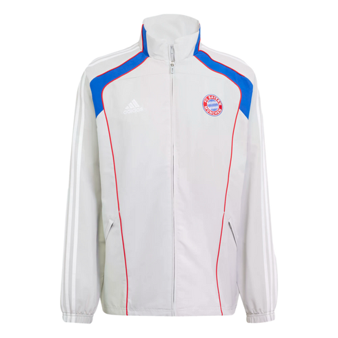 Light gray Adidas FC Bayern Munich track jacket featuring blue and red shoulder accents, the club crest, and white stripes on the sleeves.