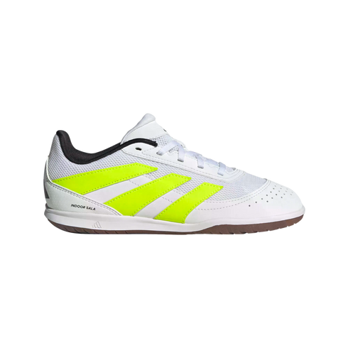 A white Adidas indoor soccer shoe featuring three slanted neon yellow stripes, white laces, and a brown gum rubber sole. The words "INDOOR SALA" appear on the heel.