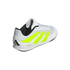 White Adidas indoor soccer shoe with neon yellow stripes and black accents, featuring "INDOOR SALA" branding.