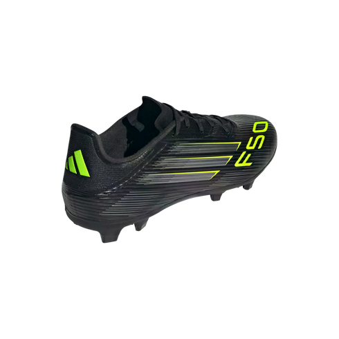 A black Adidas F50 soccer cleat featuring lime green accents and speed line graphics, shown from a rear side angle on a solid black background.
