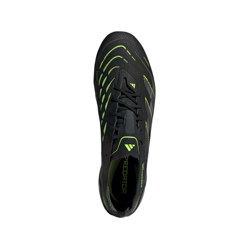 Top-down view of a black Adidas Predator soccer cleat with neon green accents and laces, displayed against a solid black background.