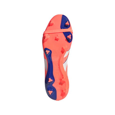 Bottom view of a coral and blue Adidas Predator soccer cleat featuring a studded outsole, embossed "PREDATOR" text, and a forefoot strap.