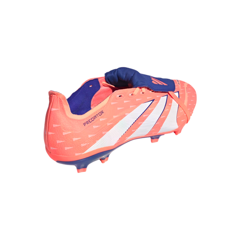 Salmon-colored Adidas Predator soccer cleat with white stripes and a blue fold-over tongue, shown from the side against a black background.