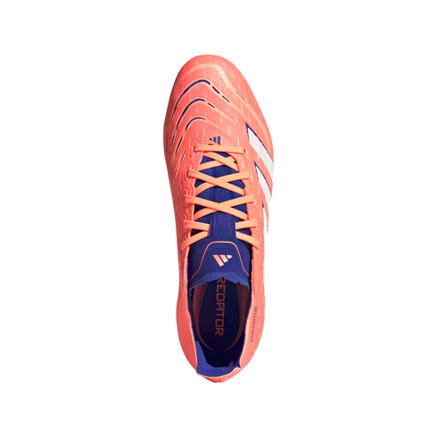 Top-down view of a bright orange Adidas Predator soccer cleat with blue accents and white stripes, set against a solid black background.