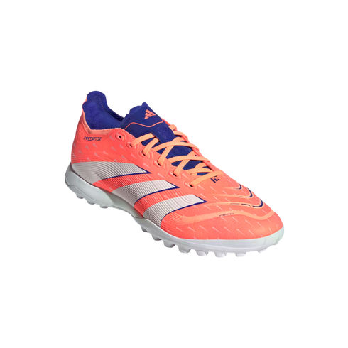 Bright orange and purple Adidas Predator turf soccer shoe with white stripes, shown from a side angle against a black background.