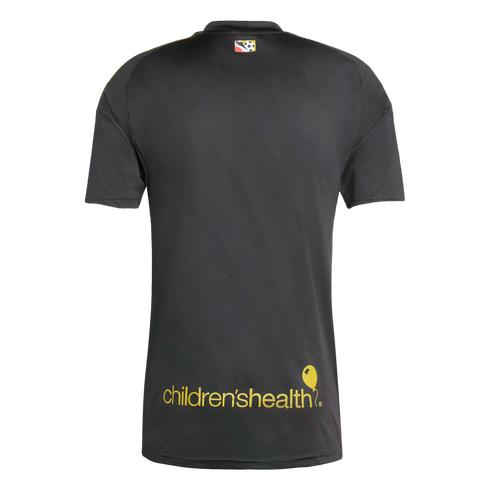 The back of a black short-sleeve shirt featuring a small logo on the upper back and the yellow "children'shealth" logo with a balloon icon at the lower back.