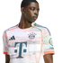 A young man wearing a white, peach, and mint green FC Bayern Munich soccer jersey against a white background.